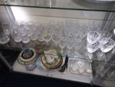 A quantity of cut glass drinking vessels, contents