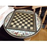 A decorative chess board depicting Asian hunting s