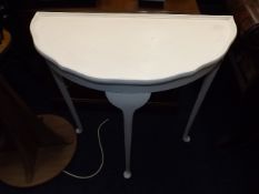A painted D shaped hall table