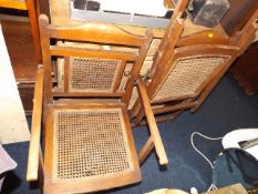 Two antique Indian Railway folding chairs