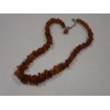 A rough cut amber necklace