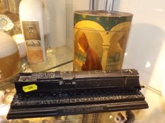 A model of diesel locomotive carved from coal & a
