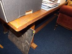 A stained pine refectory table in excess of 8ft