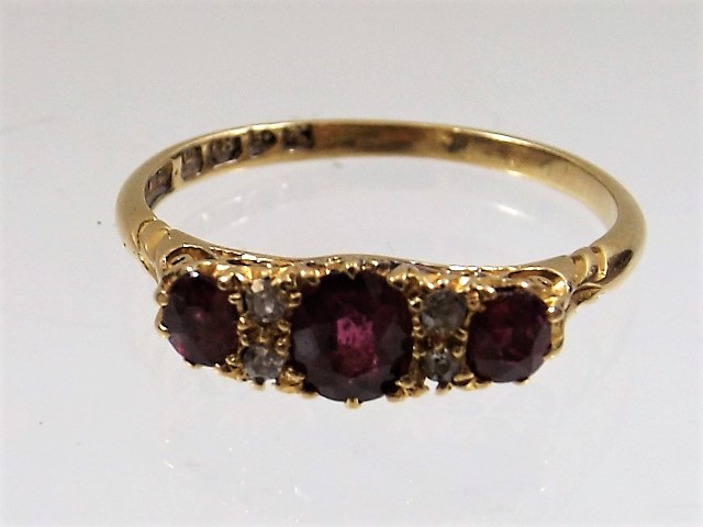 An antique 18ct gold ruby & diamond ring