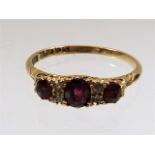 An antique 18ct gold ruby & diamond ring