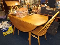An Ercol dining table & four chairs