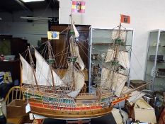 A wooden model of a sailship