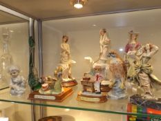 A quantity of decorative figures & similar items