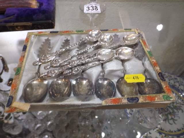 Six white metal Chinese teaspoons twinned with sim