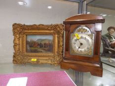 A decorative clock & a 20thC. gilt framed oil