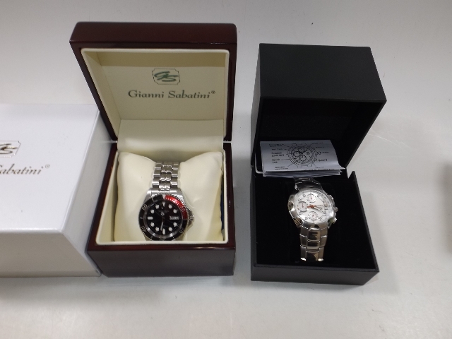 Two modern watches, boxed