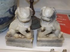 A pair of soapstone foo dogs