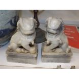 A pair of soapstone foo dogs