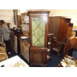 A Georgian style glazed corner cabinet