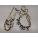 Two ethnic bone necklaces