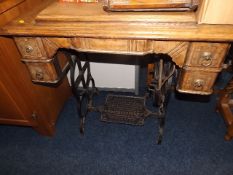 An antique sewing machine & table
