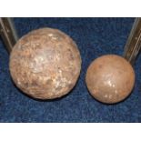 An 18thC. cannonball & one other