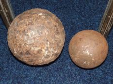 An 18thC. cannonball & one other