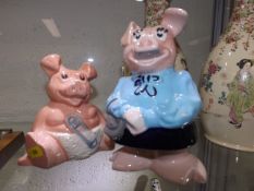 Two ceramic NatWest pigs