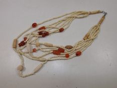An ethnic bone & agate necklace