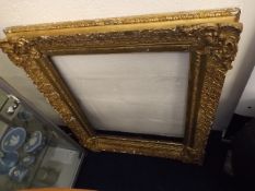 A large antique gilt picture frame