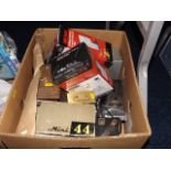 A box of cameras & other items