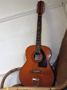 A vintage Eko navajo 12 string acoustic guitar