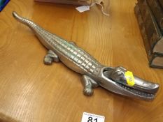 A vintage novelty crocodile nut cracker