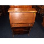 A slimline oak bureau