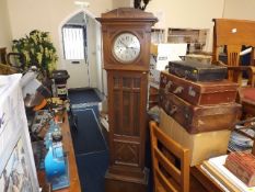 An early 20thC. oak long case clock