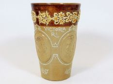 A Doulton stoneware beaker commemorating Victoria'