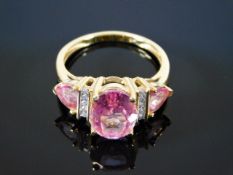 An 18ct gold pink tourmaline & diamond ring