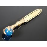 A Victorian brass claw & aquamarine style ball boo