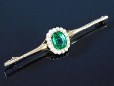 An antique 15ct brooch with natural pearl & tourma