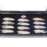 Twelve Harley Davidson pocket knives in display ca