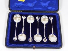 A boxed set of silver spoons