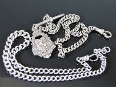 Two silver albert chains