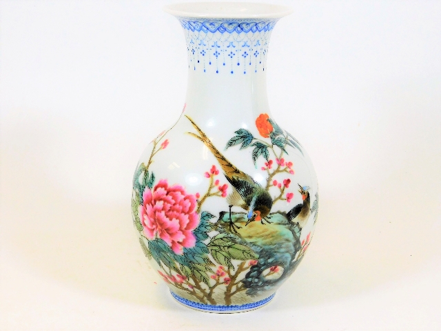 A hand decorated Chinese famille rose porcelain va