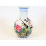 A hand decorated Chinese famille rose porcelain va