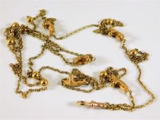 A yellow metal guard chain with bear decor