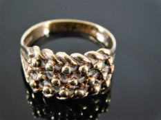 A 9ct gold rope style ring
