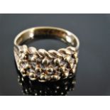 A 9ct gold rope style ring