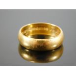 A 22ct gold wedding band