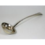 A silver Georgian ladle with old repair