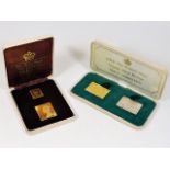 Three 22ct gold replica commemorative stamps & one