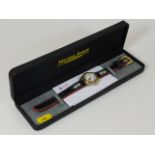 A Michel Jordi boxed wristwatch