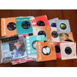 A quantity of vinyl singles including Rolling Ston