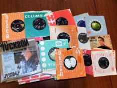 A quantity of vinyl singles including Rolling Ston
