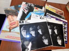 A quantity of vinyl LP's including Beatles & Rolli