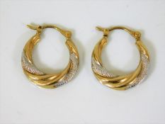 A pair of ladies 9ct gold two tone earrings
